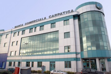 Directorul Băncii Carpatica îi cere patronului să o vândă